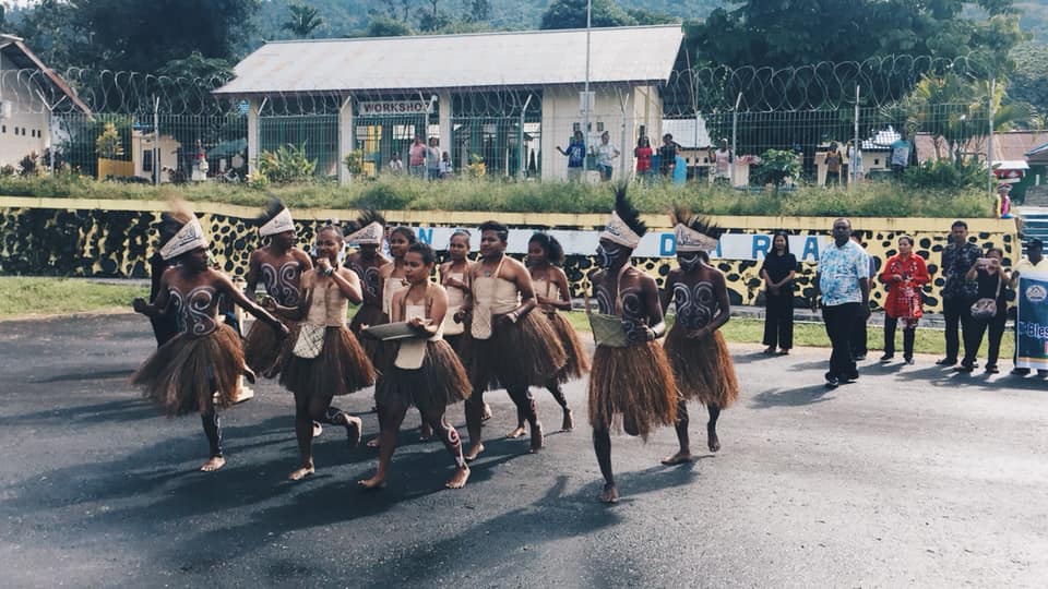 A local tribe in Wasior performing a traditional dance to welcome visitors to the village.
