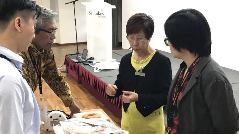 Sister Susie Goh trains other healthcare professionals on how to treat wounds effectively at the Negative Pressure Wound Therapy course. Photo courtesy of St Luke's Hospital