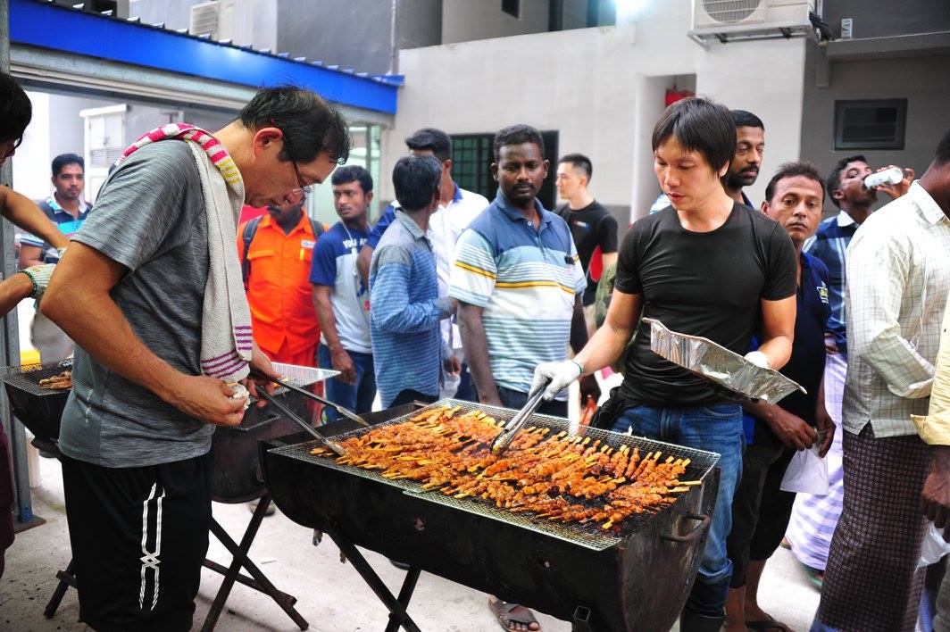 Volunteers barbecuing satay sticks at a April 2017. Photo courtesy of Project Chulia Street.
