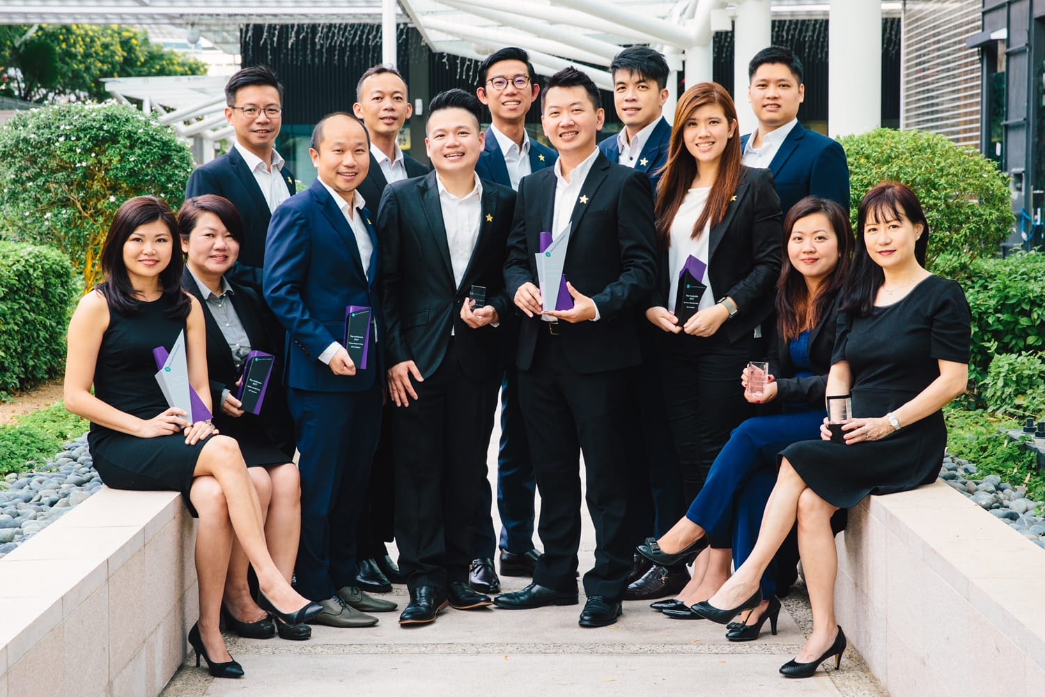 Clarence (last row, middle), together with his colleagues. At a company-wide talk, he urged his colleagues to rethink their definition of success. He quoted Cullen Hightower, who said: "A good measure of your worth includes the benefits others have gained from your success."