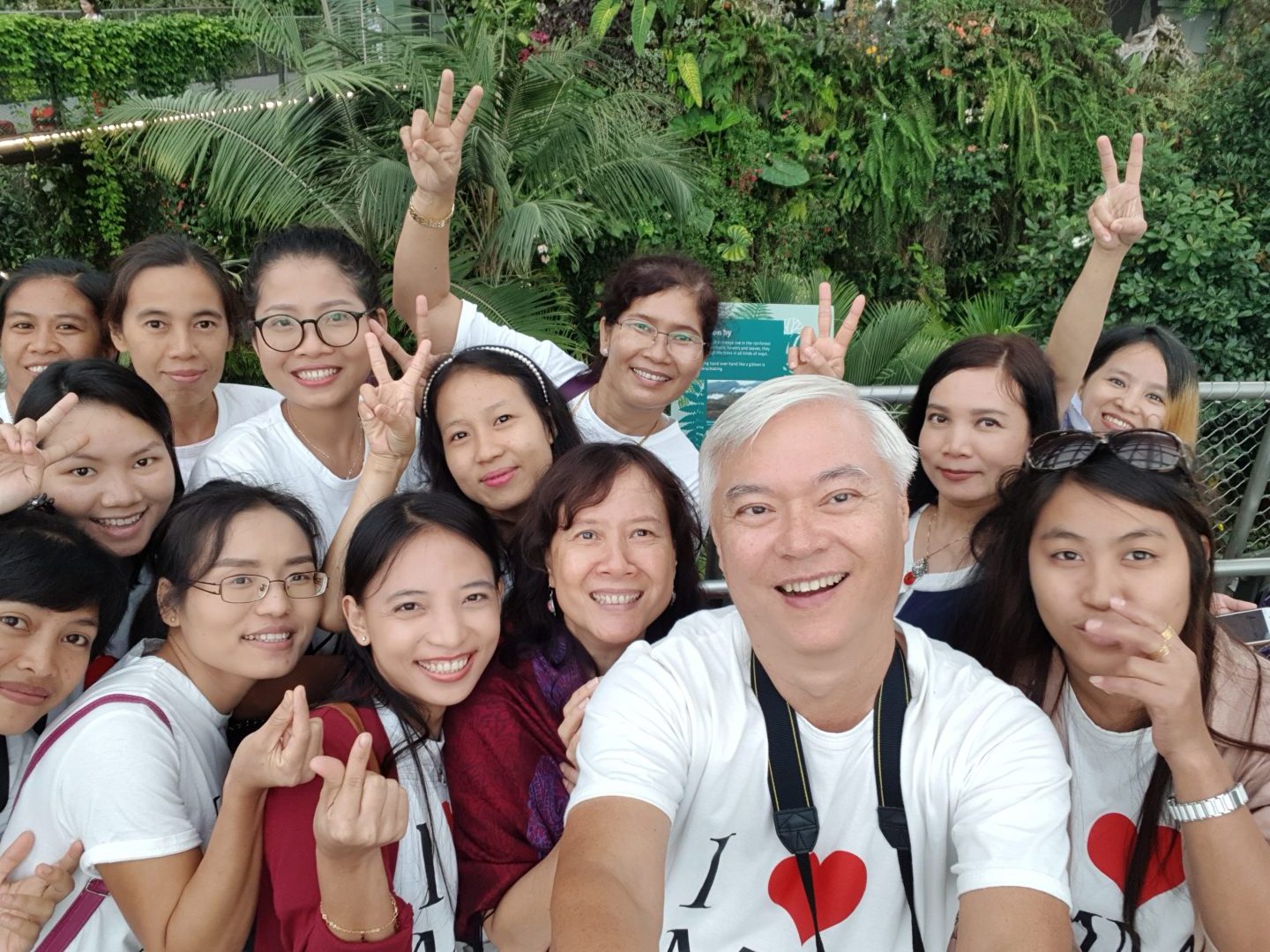 James Quek, centre, runs a maid agency that is centred around the welfare of the domestic helpers that they place. <i>My Helper</i> has been recognised for its fair business practices in the industry. Photo courtesy of <i>MyHelper</i>.