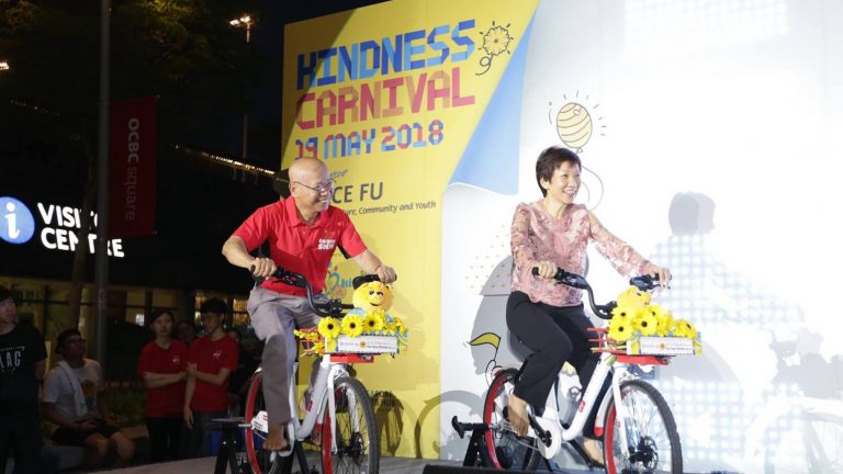 Rev Dr William Wan (left) with Minister Grace Fu at the opening ceremony of the Kindness Carnival 2018 which kickstarts a month of celebrating kindness in Singapore. First initiated in 2013, this year's Kindness Day SG falls on 24 May 2019. (Photo courtesy of Singapore Kindness Movement Facebook)