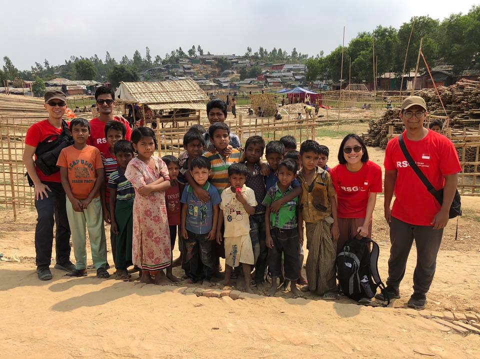 Jonathan How (extreme left) together with Relief Singapore volunteers after a game of badminton with Rohingya youths in Cox's Bazar.