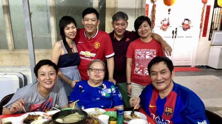 Caleb Tan (standing, second from left) found God, love and family when he stepped into halfway house, The Hiding Place. Photo courtesy of Caleb Tan.