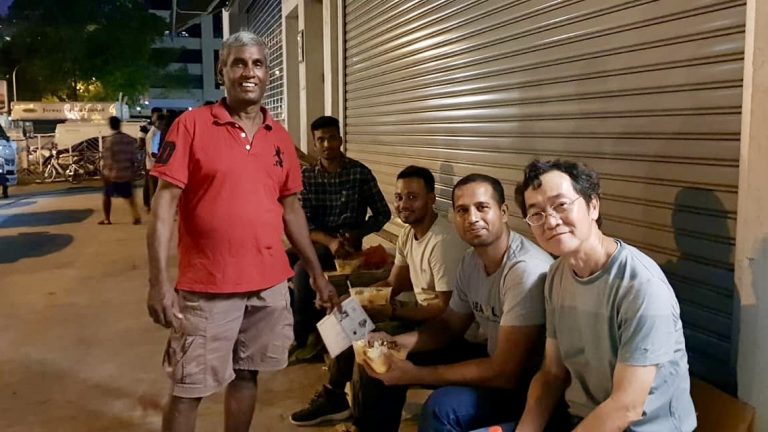 Volunteers from SG Care Welcome Centre sharing a briyani meal with migrant workers living in the dormitories located in Tai Seng. It is estimated that some 5,000 of them are living there in factory-converted dormitories. All photos courtesy of SG Care Welcome Centre.