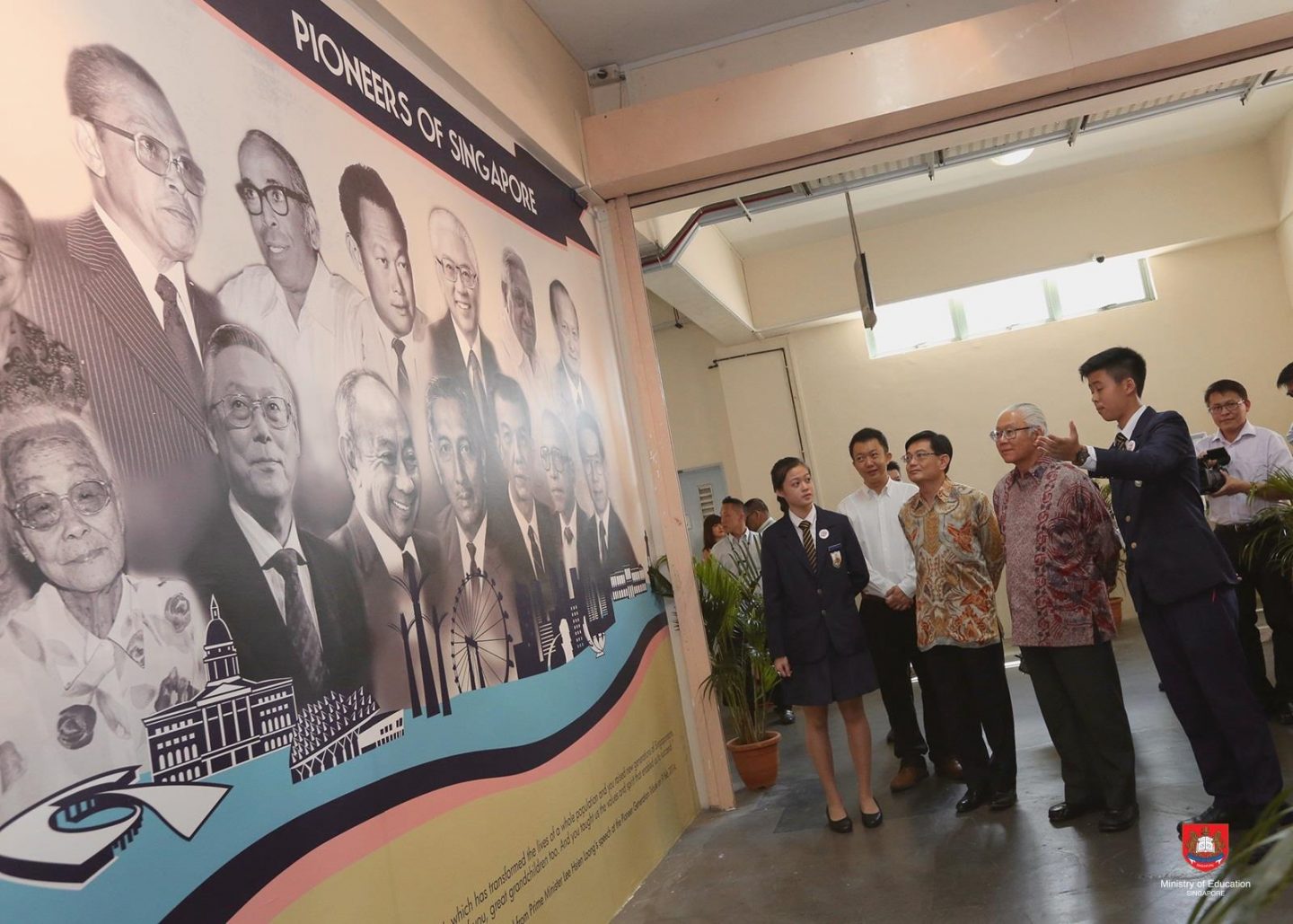 Student leaders from Presbyterian High School (PHS) showing the Pioneer Generation Wall to President Dr Tony Tan in 2015. In 1978, just 13 years after the school (formerly known as Li Sun High School) was set up, the Presbyterian Synod wanted to shut the school due to poor enrolment. But the late Rev Lee stepped in, helping to turn the school around. Photo from Ministry of Education, Singapore's Facebook.
