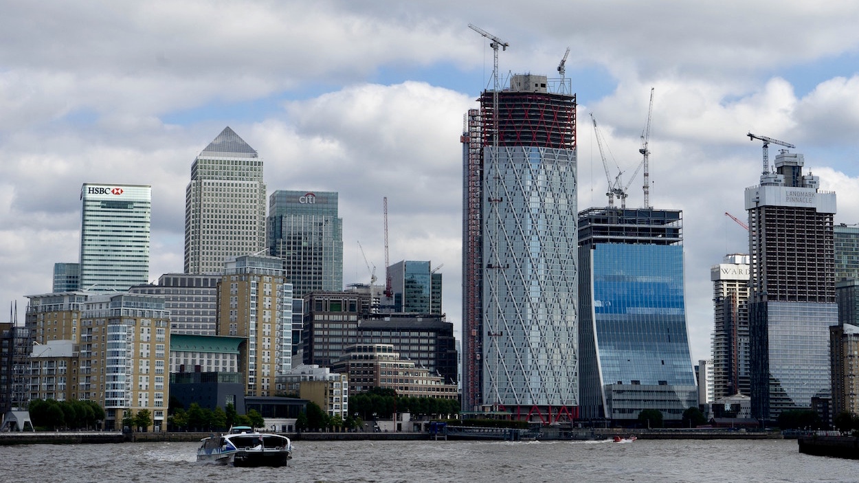 Thio's advice to HPL to purchase land at Canary Wharf was God-inspired. The project, Canary Riverside (left, foreground), went on to do very well. Photo by Joseph Gilbey on Unsplash.