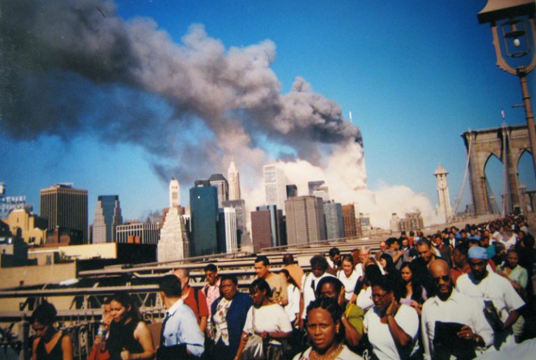 A photo of the evacuation underway when the South Tower collapsed on September 11, 2001. It was the tower which Judith Francis was escaped from after it was hit by the second hijacked plane. Photo by J Philip O’Brien on Flickr.