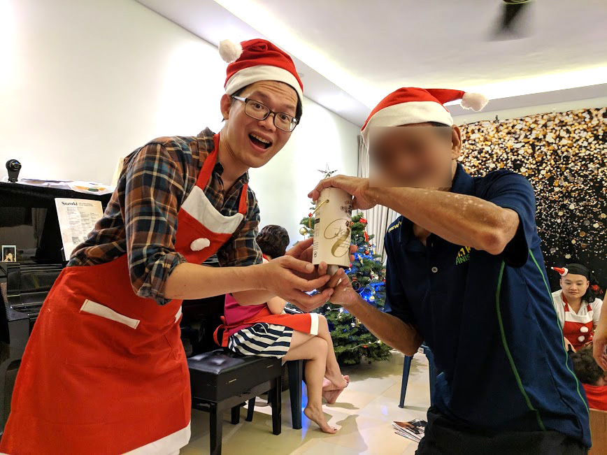 Founder of Homeless Hearts of Singapore, Abraham Yeo (left), who attended the gathering, encouraged more people to open up their homes to the less fortunate this Christmas. "God's definition of family is far bigger and more magnificent," he said.