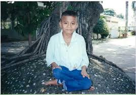 Young Longdy in Thailand, where he worked as a child beggar for two years.