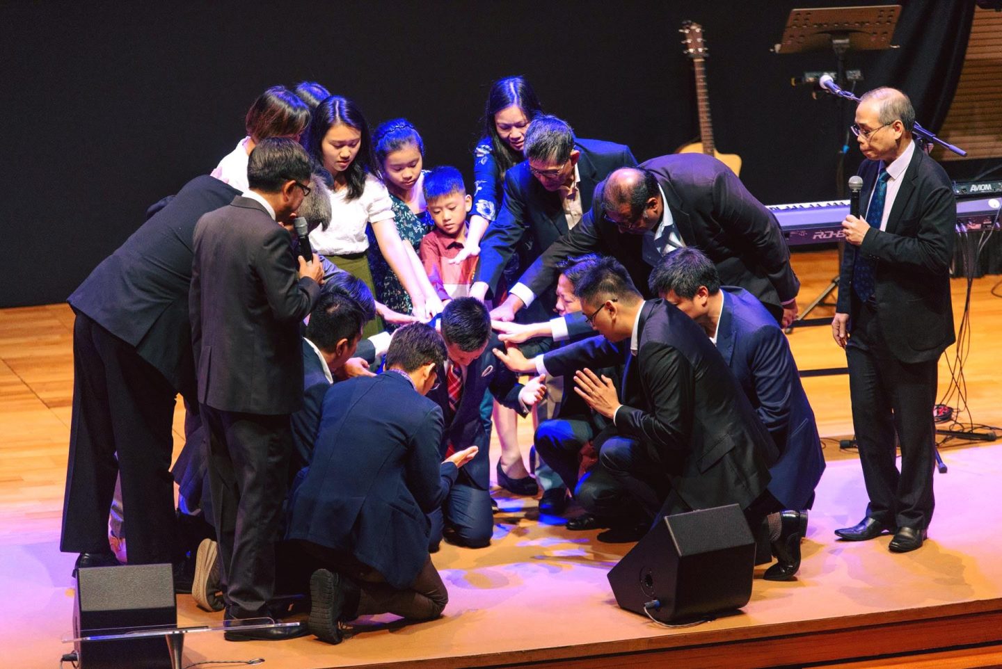 Church leadership praying over Rev Wilson Teo during his installation as Senior Pastor on January 1, 2020. Previously the Executive Pastor, Rev Wilson took over the mantle from Rev Calvin Lee. Photo from Grace Assembly Of God Facebook.