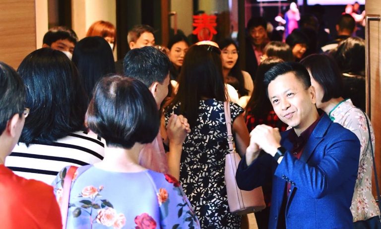 Rev Wilson Teo greets congregants during Chinese New Year – it was his first Chinese New Year as Senior Pastor of Grace Assembly. Photo from Grace Assembly Of God Facebook page.
