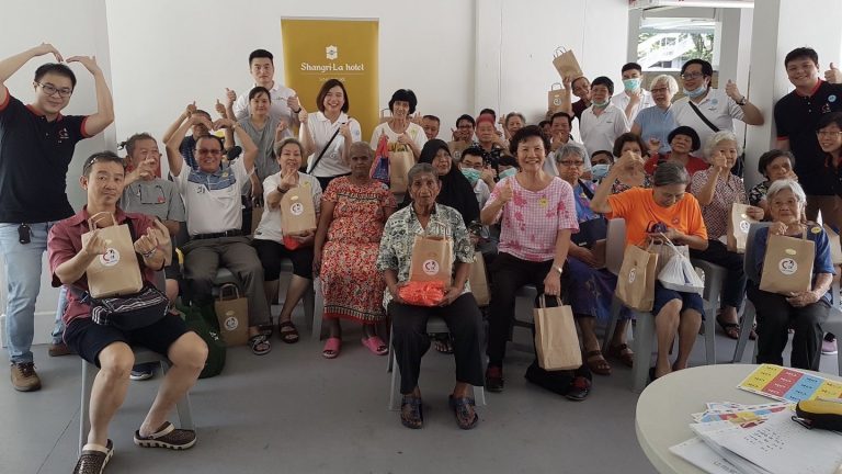 Care Corner Singapore, together with corporate partner, Shangri-La Hotel, packed and distributed care parks to vulnerable seniors. But more help is needed to reach this group, says Care Corner Singapore's Gary Lim. Photo from Shangri-La Hotel, Singapore's Facebook page.