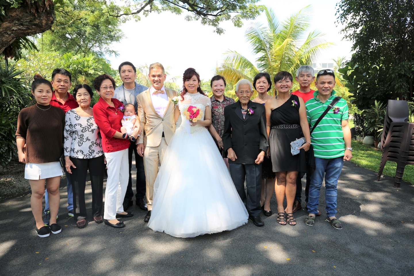 Chai Lai and Bee Leng with their family members after their wedding ceremony in Breakthrough Missions on May 5, 2018.
