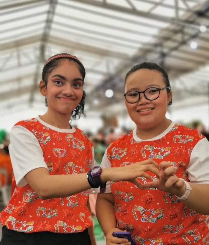 Farzana Zaman (left), 18 with her friend Celstine Kwek, 20. Both have learning disabilities and are regulars at SFR workshops.