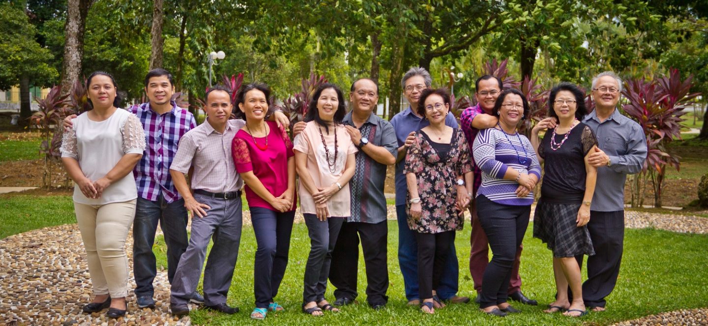Photo of Pastor David (sixth from left) and the pastoral leadership team at Emmanuel Baptist Church (EBC) in Kuching, Malaysia. Photo on EBC website.