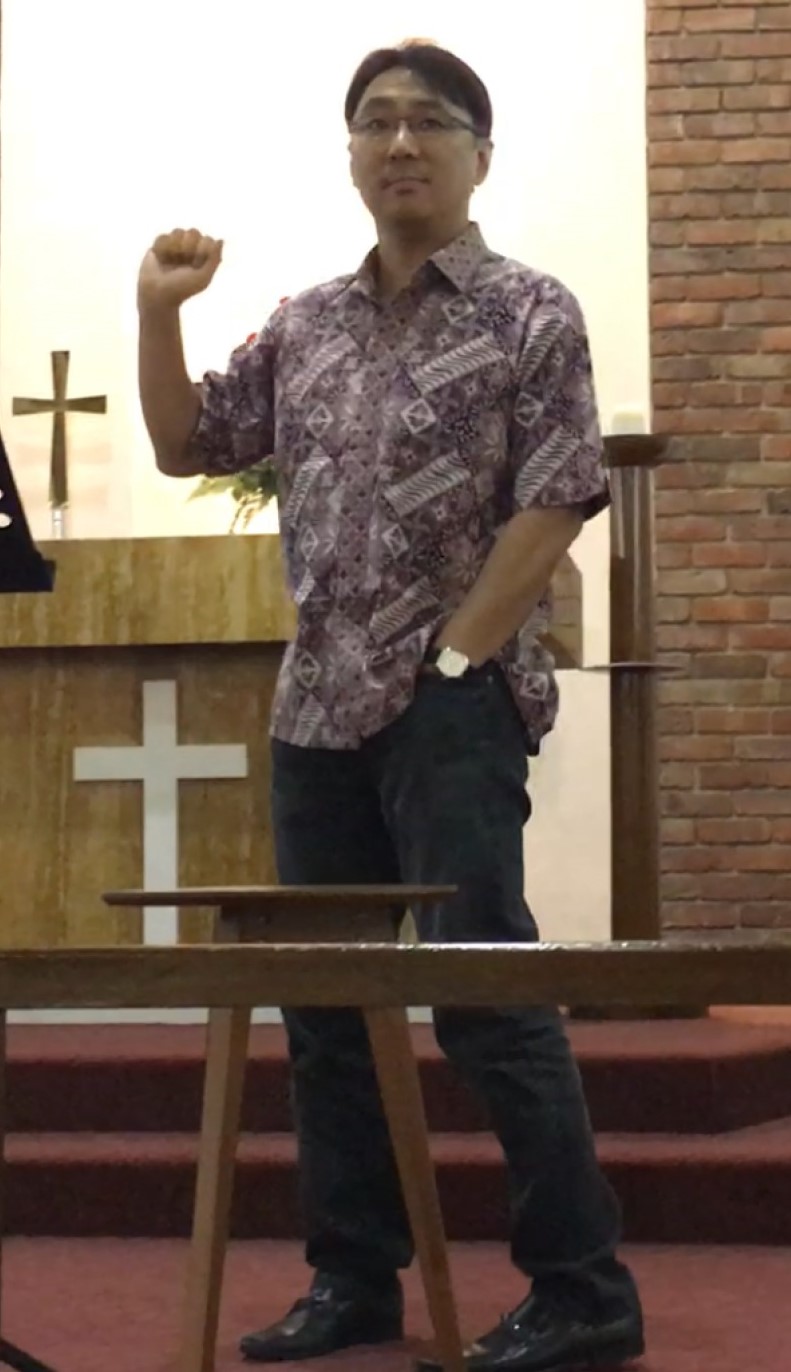 Thong sharing a sermon at All Saints’ Church. 