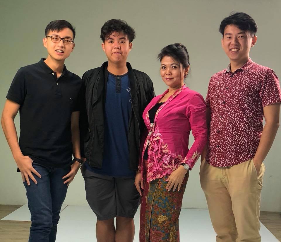 Chng with her sons (left to right) Joel, Emmanuel and Noel. 