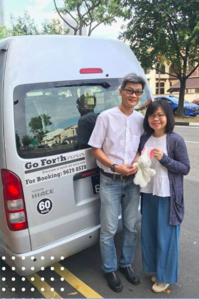 Yeoh and Mei with their van, which is fitted with a hydraulic lift to accommodate wheelchair users.