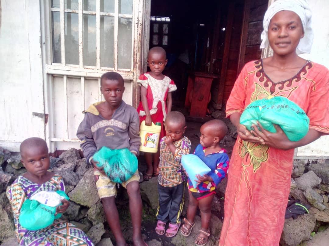 This lady was widowed and left with 2 children. She also took in another 3 kids when their parents were both killed in an accident. She said the day the team came, they were all prepared to go another night without any food. She exclaimed, “It’s like living the Bible.. God is the God of widows and orphans!”