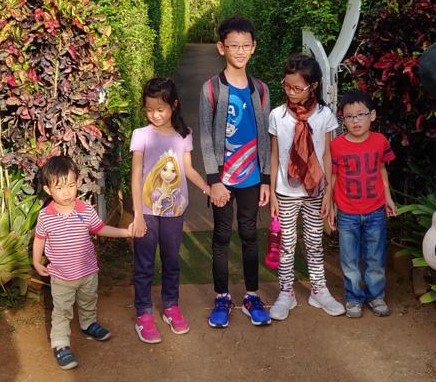 (Left to right) Daniel Chong and Ong’s four children – Charis, Josiah, Arielle and Ethan on a holiday in Thailand in 2018. Photo courtesy of Chong Ee Jay.