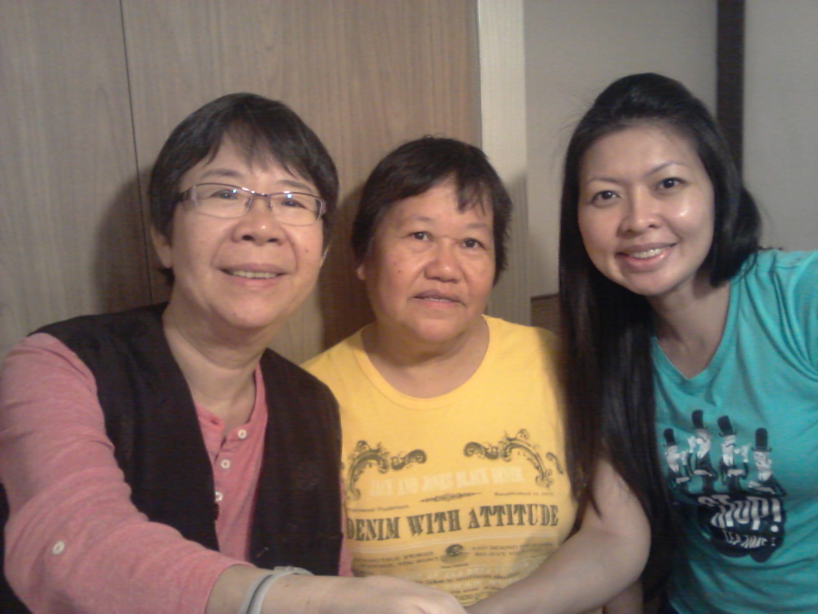 Ng (left) and Khew (middle) with Wee, who was transformed by the warmth and love that she experienced in the halfway house.