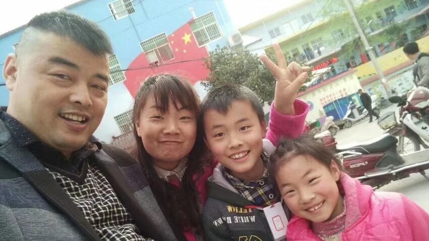 Huang with his family in China just before he returned to Singapore to work.