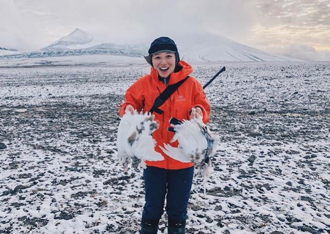 Weisi with her catch of ptarmigans after five hours of hunting