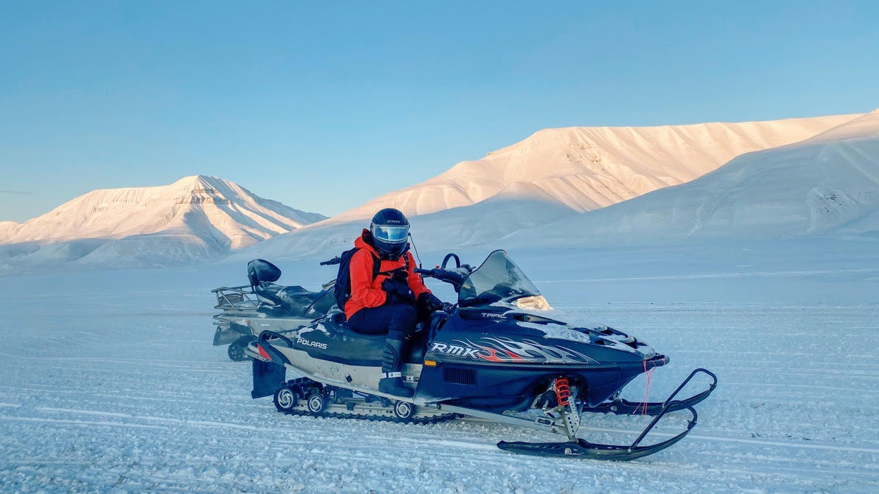 Weisi on Lillemy, her snowmobile, in Adventdalen
