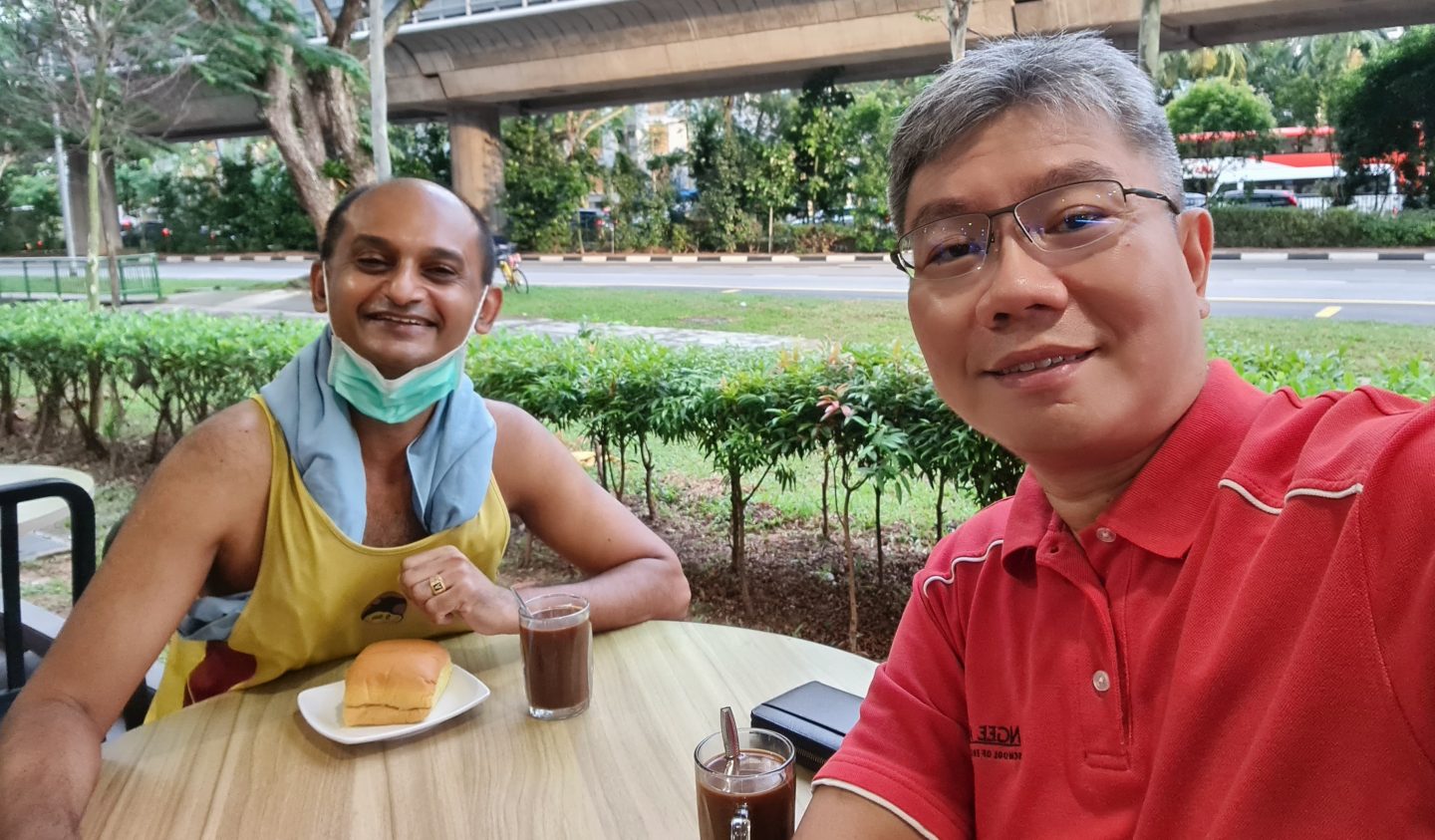 Arul (left) meeting a friend for breakfast after one of his daily walks. Throughout the time of his retrenchment, Arul's cell group and friends often made appointments to have meals with him, which Arul says was a huge blessing. 