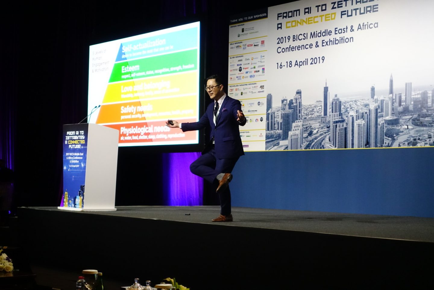Eugene speaking at a conference in Dubai.