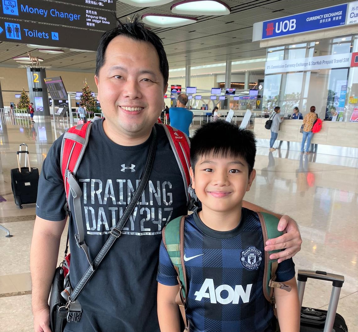 Jeremy and Ayden preparing to fly to Thailand on their first mission trip with the church. Photo courtesy of the Oh family.