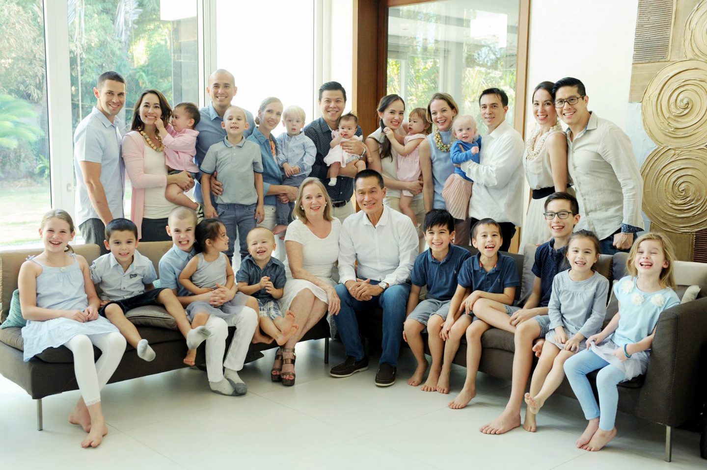 Family was so much fun that Peter Tan-Chi Jr (standing, third from right) never found the need to bow to peer pressure. Here, Peter Jr is seen with his siblings, their spouses and children and his parents (seated, centre). Photo from Rev Dr Peter Tan-Chi's Facebook.