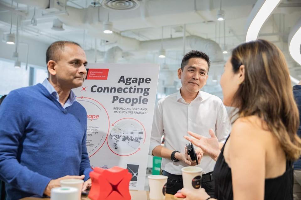 Anil (left) with CEO of Agape Connecting People, Joseph See (middle) at their office in Tai Seng Avenue. Photo courtesy of Anil David.