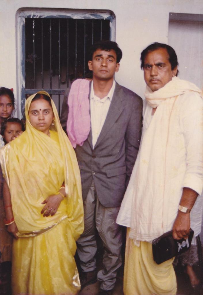 Anil with his parents in his young adult days.