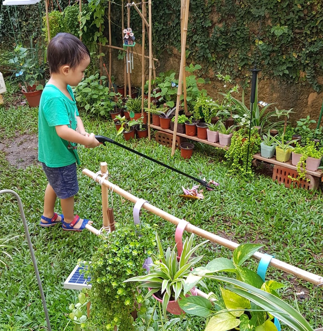 Gideo helps out in the garden where he has seen God's creative power at work.
