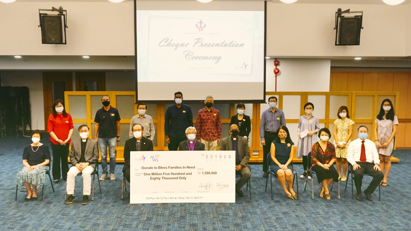 Over 900 applicants have benefitted from the $1.5 million raised by MCS's "Donate-to-Bless" campaign. At the cheque presentation ceremony, 12 representatives from various agencies were given over $160,000 worth of aid. Photo courtesy of The Methodist Church in Singapore.