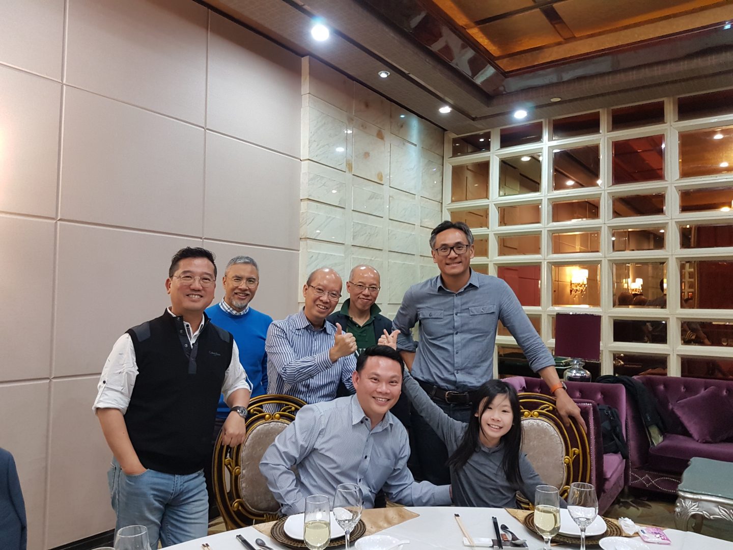 Jeremy with his daughter on a business trip to Shenzhen, China. They met leaders of a big fashion company and guided them on setting a goal to donate one million pieces of clothing to various charities.