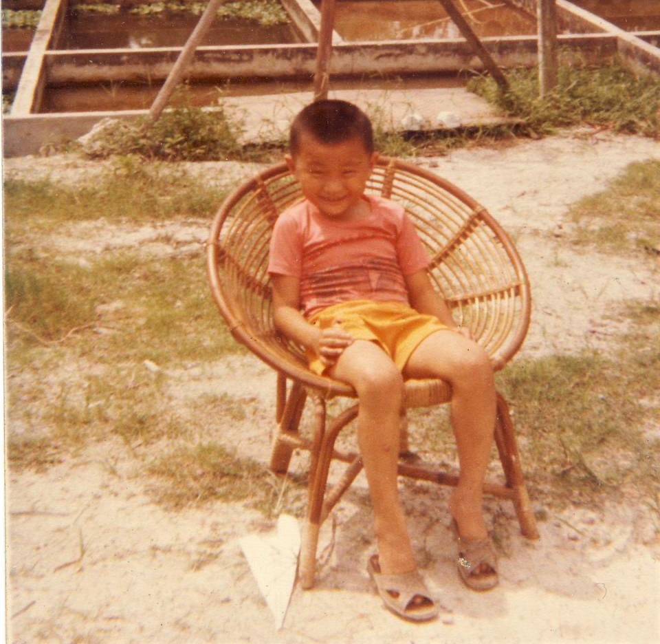 Tan had a happy childhood, living in the kampung,