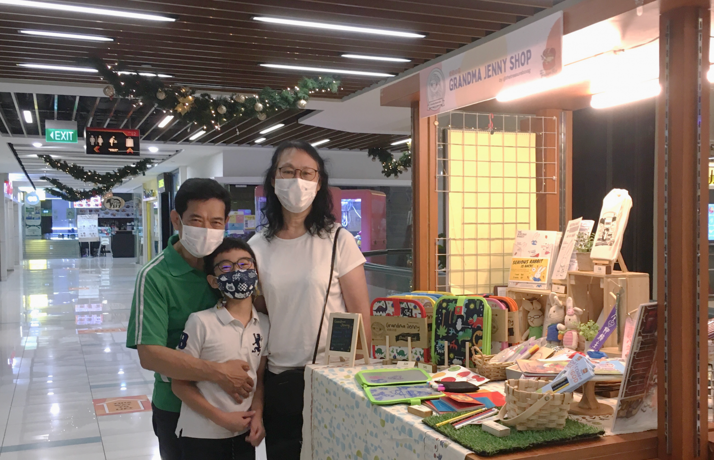 Jenny with her husband, George, and grandson, Nathan at their little stall located on Level 2 of Bukit Timah Plaza. One of the divine confirmations was that Jenny is allowed to close the shop on Sunday, a condition she was very insistent on, as she wanted to attend church.