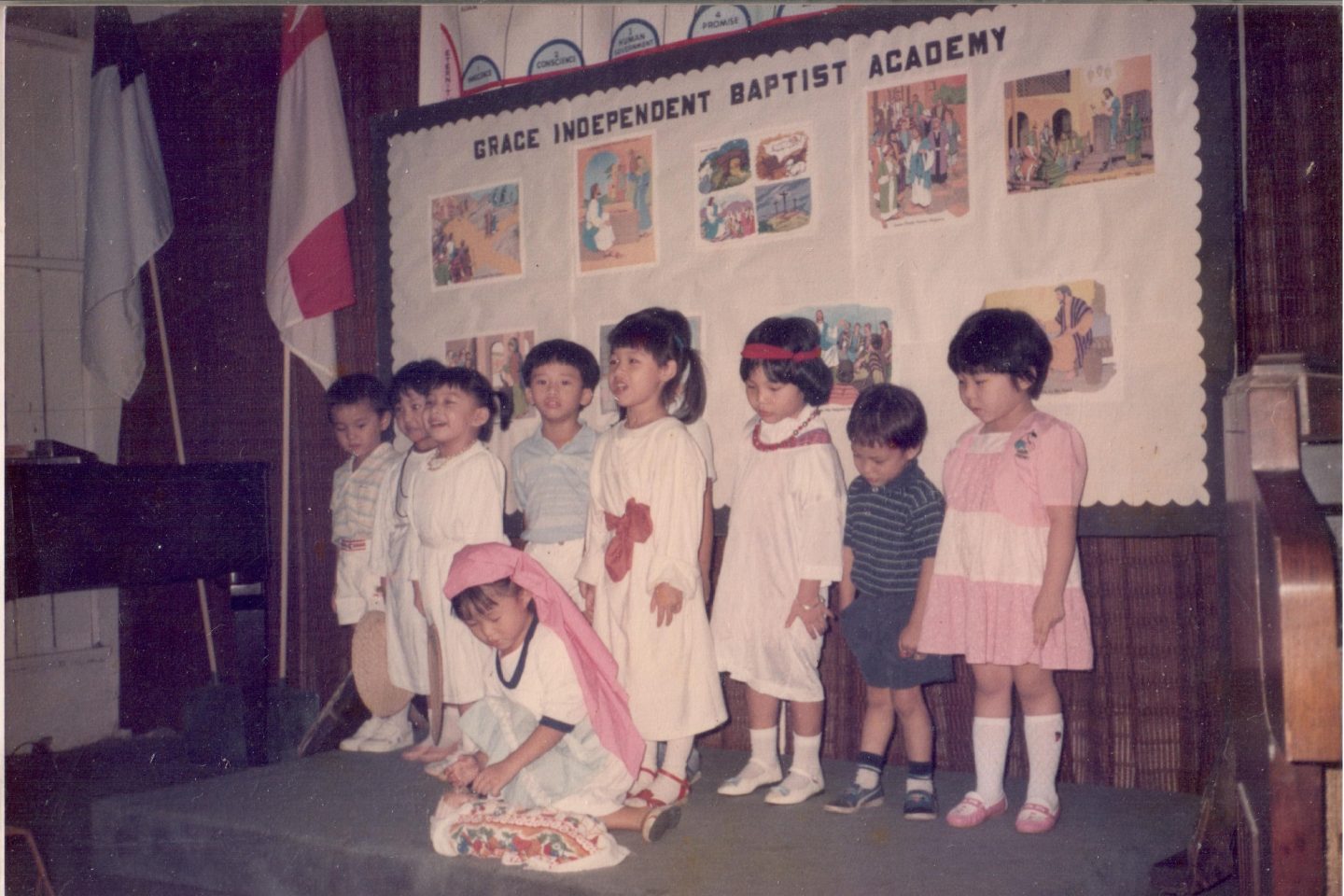 Four-year-old Arielle acting as Mother Mary in a Christmas play in the church the American missionary invited her to. 