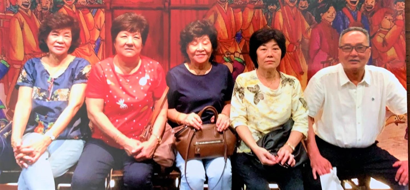 When Lim finally got baptised, his sisters turned up to support him.