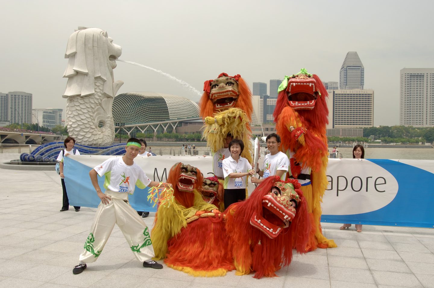 Receiving the torch at Marina Bay in October 2006 for the Melbourne 2006 Commonwealth Games when it passed through Singapore. The torch travelled from Buckingham Palace in London on an epic 180,000 km to the opening ceremony of the Games.