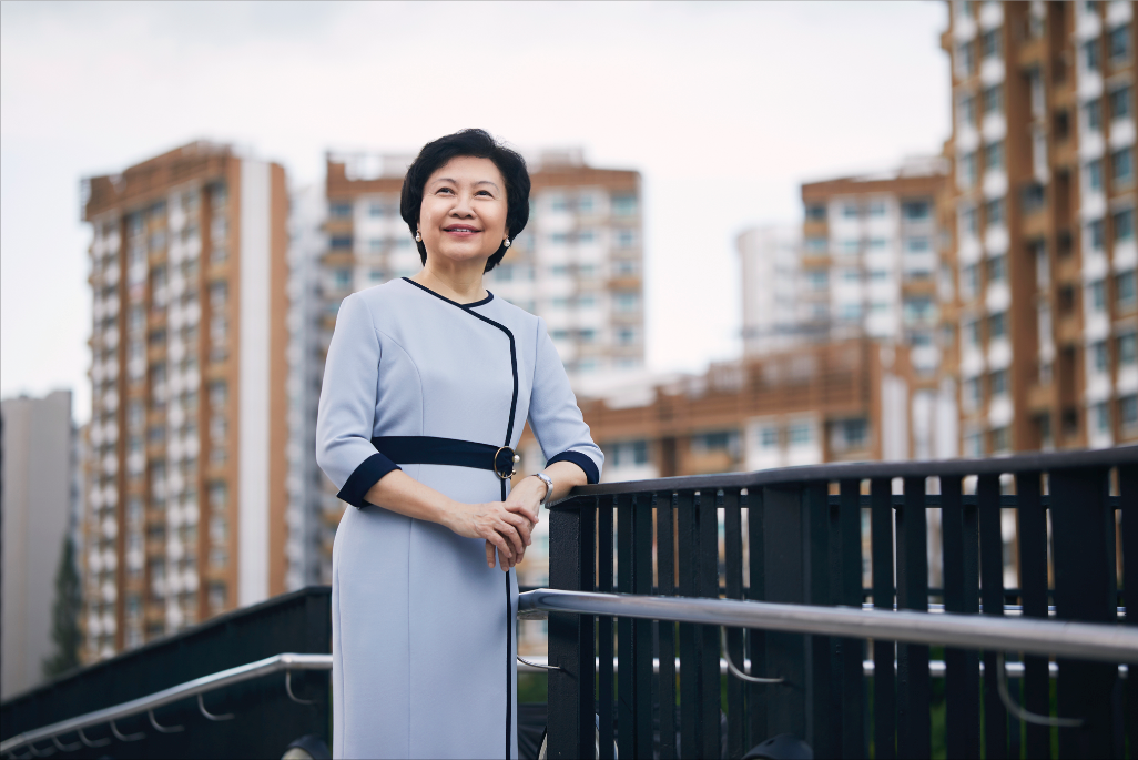 Dr Cheong in 2020, at a bridge over the Punggol Waterway with the new generation HDB flats in the backdrop. Punggol was selected by HDB to be developed into its first sustainable town, with eco-friendly and smart technologies to enhance liveability. 