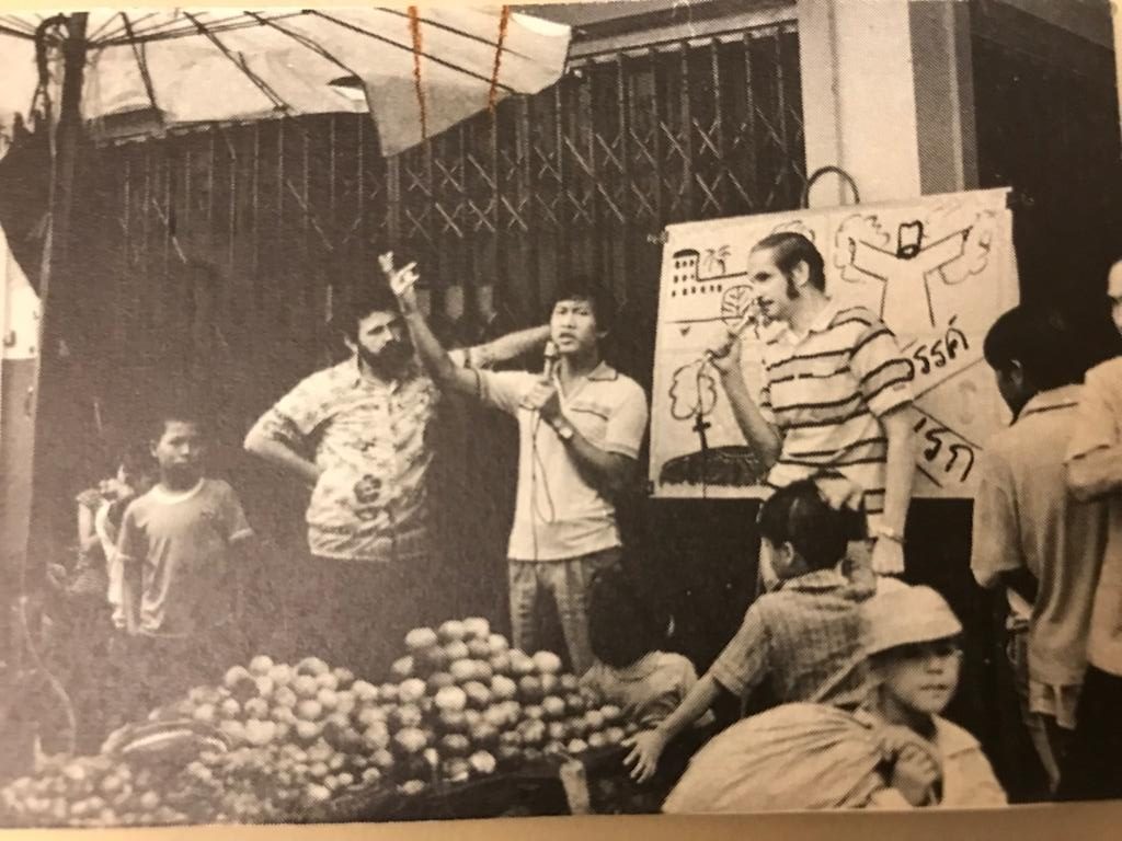 Rev Lai preaching in a market in Thailand as part of the Logos evangelism team. "It was all 'fruitful' in front of me," joked Rev Lai. Photo courtesy of Rev Keith Lai.