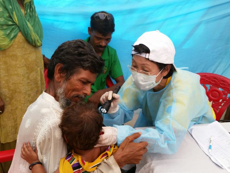 Yvonne serving at a medical camp in South Asia.