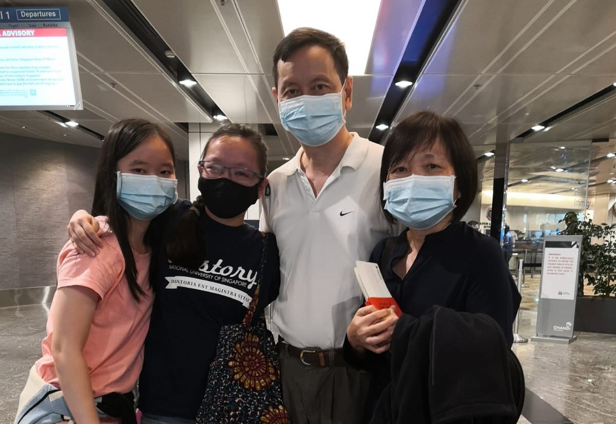 From left: Jennie and Anthony Chee and their daughters Tanya and Samara at the airport in January this year. Samara, who is studying in Kenya, left Singapore with her parents. 