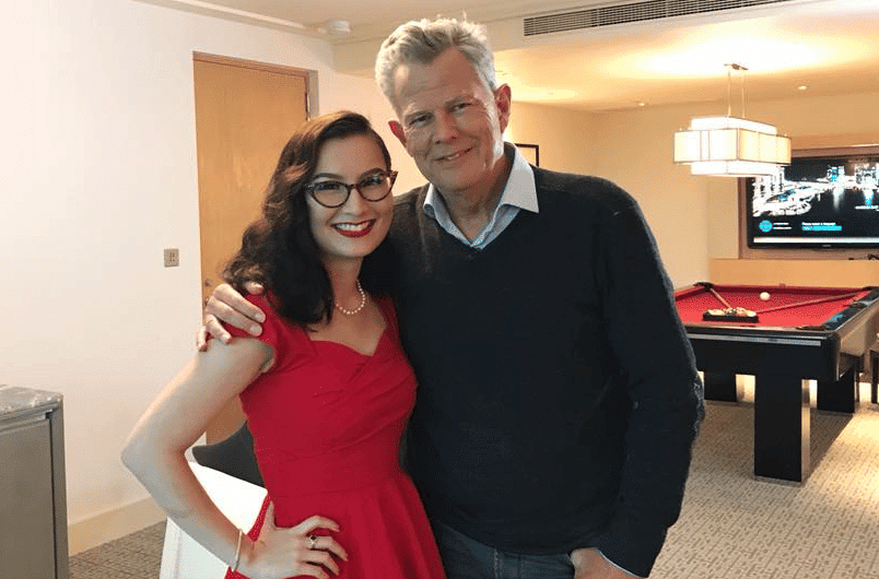 Miss Lou posing with legendary musician and producer David Foster.