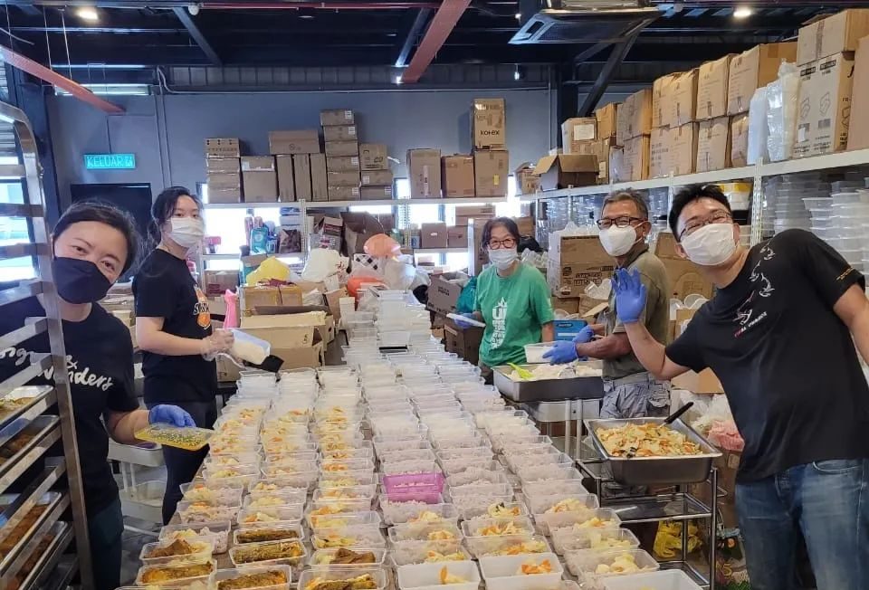Every week, around 200 volunteers come through TASK's industrial kitchen. On Saturdays, 50 volunteers cook hot meals from their own homes to be packed and distributed. All photos courtesy of TASK.
