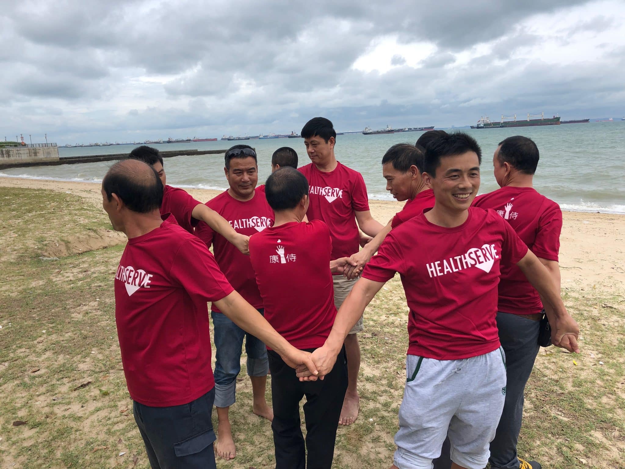 Some migrant brothers at an outing to East Coast Park in 2019, which was organised by HealthServe.
